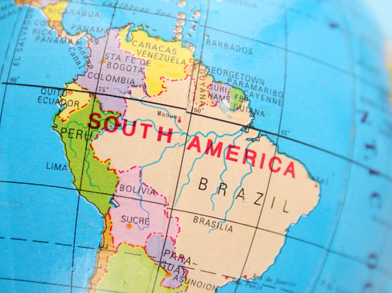 Globe with close-up of South America showing countries for travel planning.