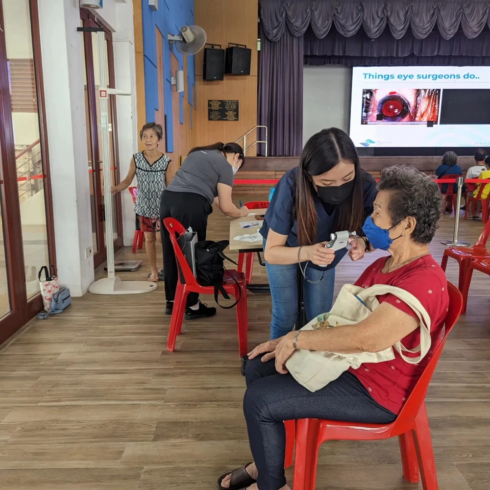 ATA Medical staff giving health screening to Cheng San residents.