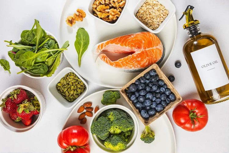 Healthy foods like salmon and nuts support hair health with biotin and antioxidants.